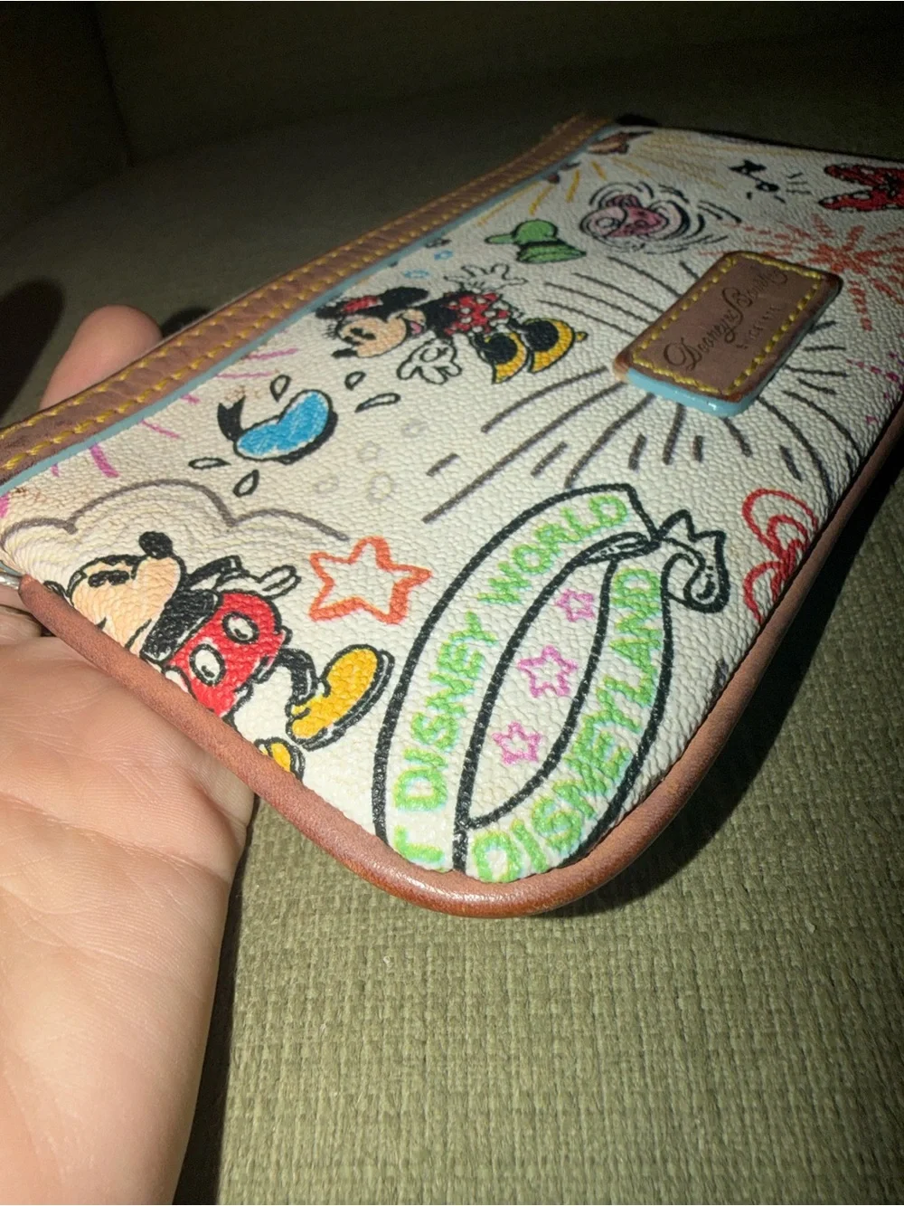 Disney Parks Sketch print wristlet by Dooney & Bourke